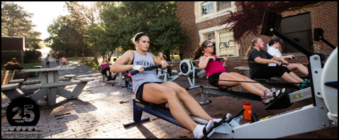 Geneseo Varsity Women's Crew team rowing on the patio