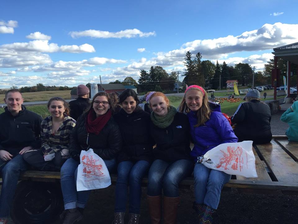 PRISM Math Club: Students on a truck posing for a photo