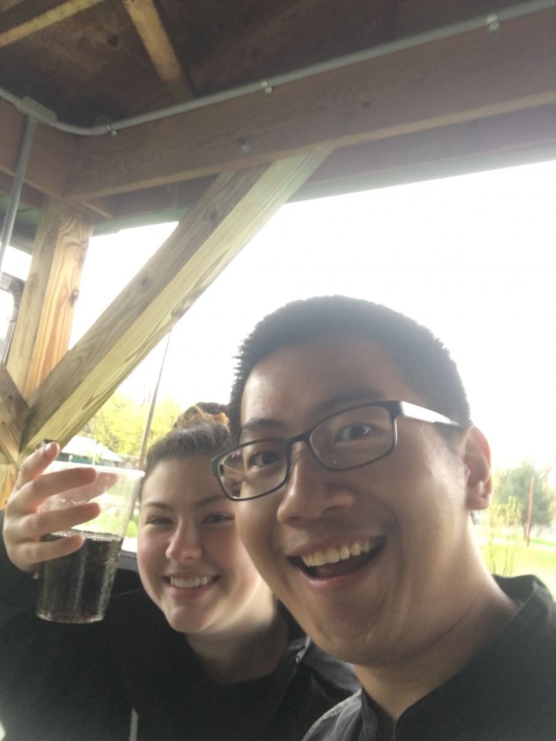 PRISM Math Club: Two students taking a selfie under a shelter