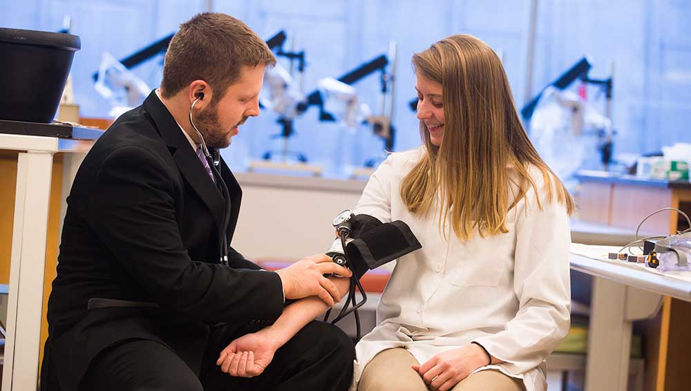 taking blood pressure