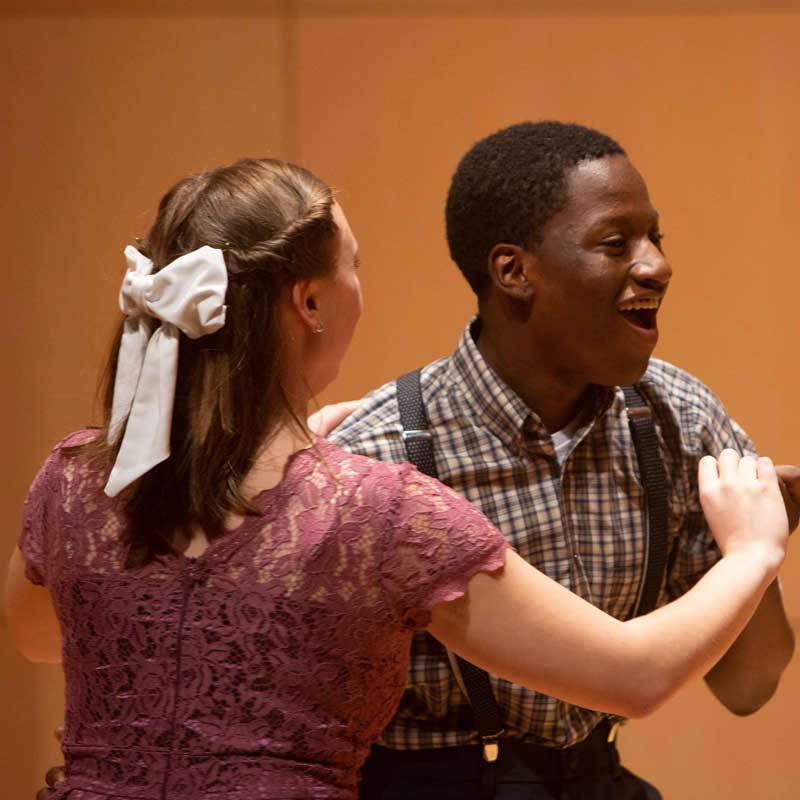 man and woman dancing