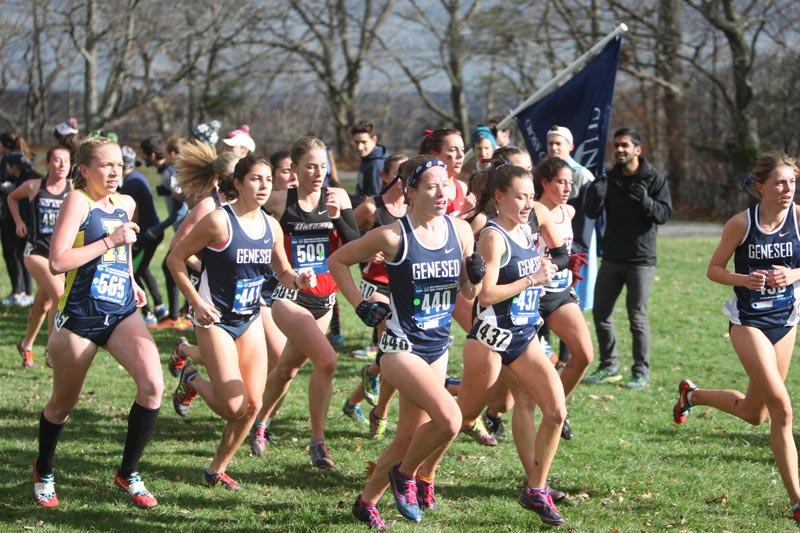 A SUNY Geneseo women's team running together outside A SUNY Geneseo women's team running together outside