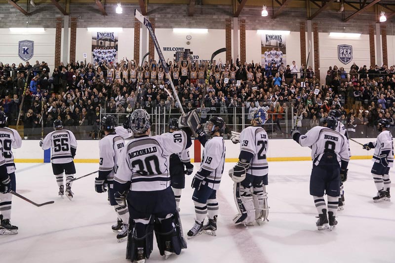Girls competing for ball while playing ruby  
