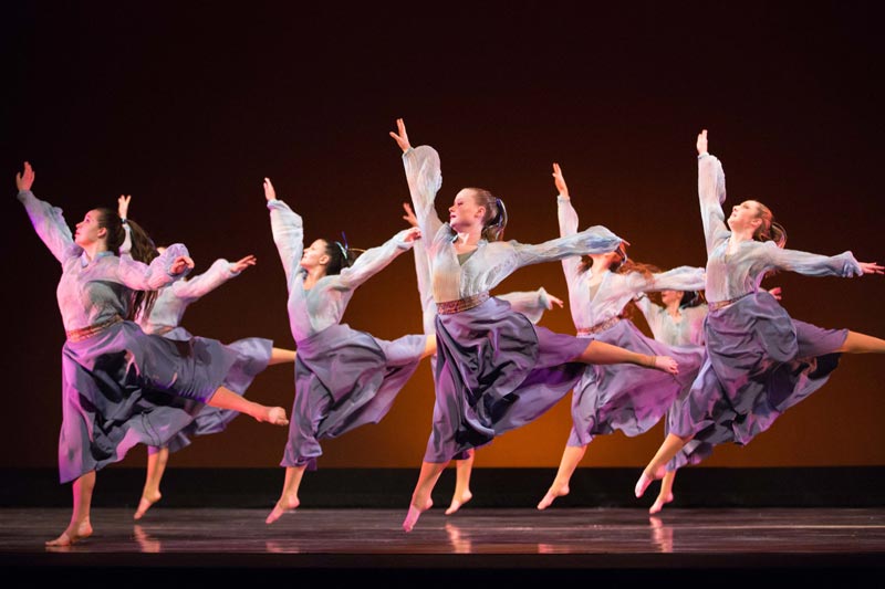 Students cheer as they play outdoor games