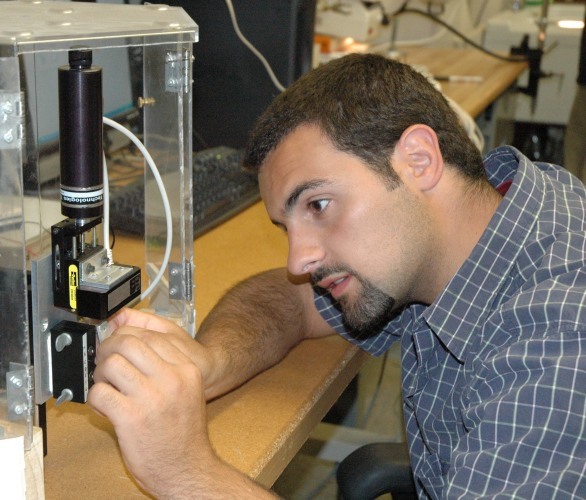 Ed Pogozelski working on a machine