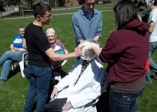 professor getting pied three times