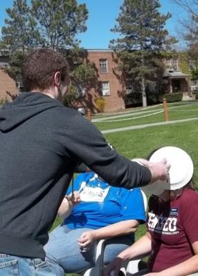 two professors while getting pied