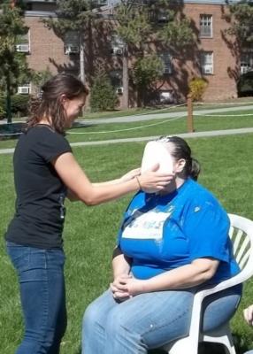 student getting pied