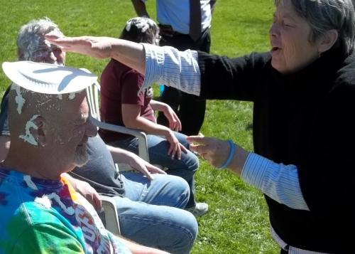 professor getting pied by a professor