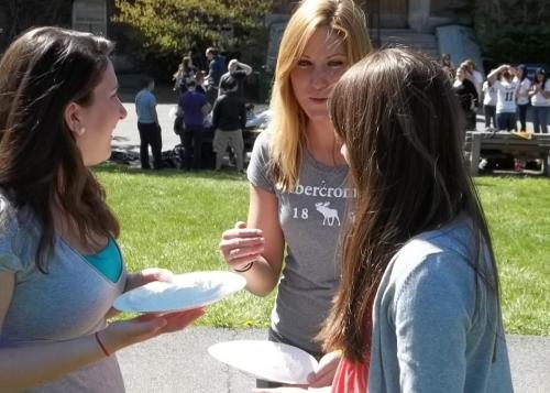 three students with pies