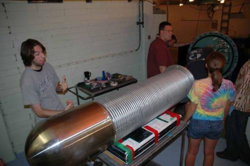 Students working on machine in lab 