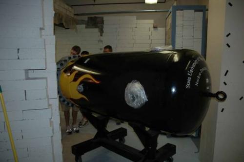 Students working on machine in lab 