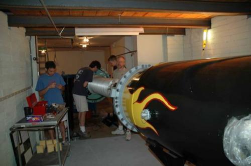 Students working on machine in lab 