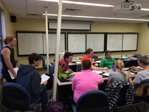 Students working at desk in Dr.Farbody 5