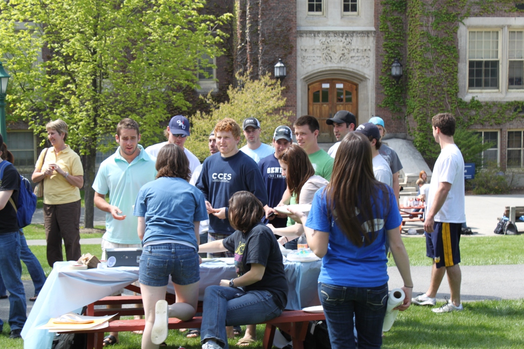 Pi in the face for autism event: Teachers sit with pie on face