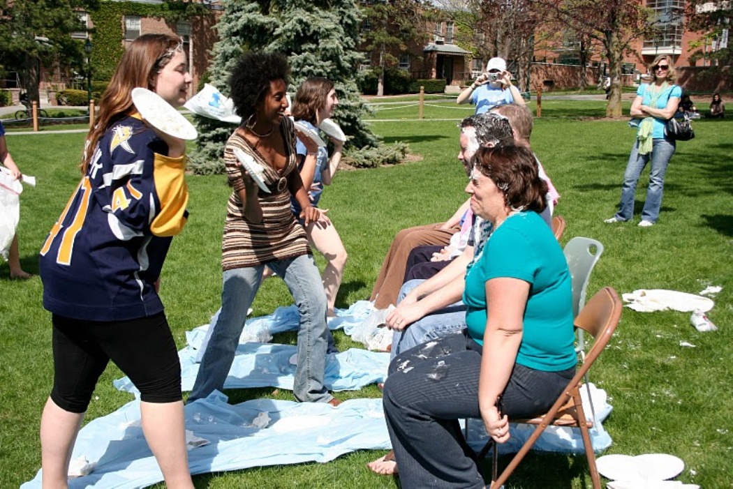 Pi in the face for autism event: teacher covered in pie
