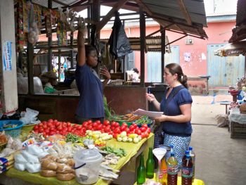 Two people at a outdoor market