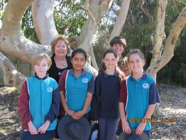 Teachers and a group of students.