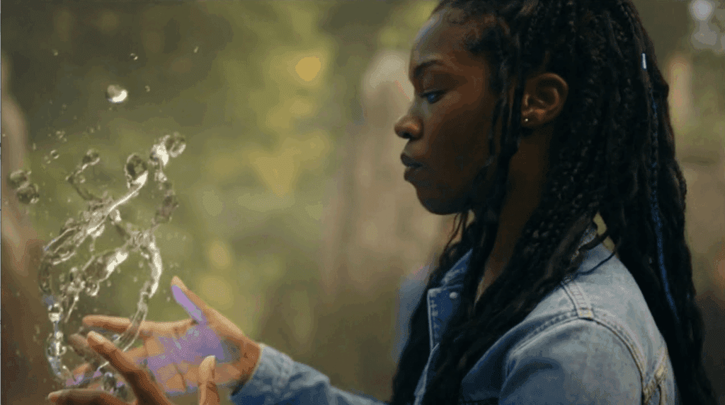 Aisha (Precious Mustapha) working with water. Screenshot from Fate: The Winx Saga (Netflix, 2021)
