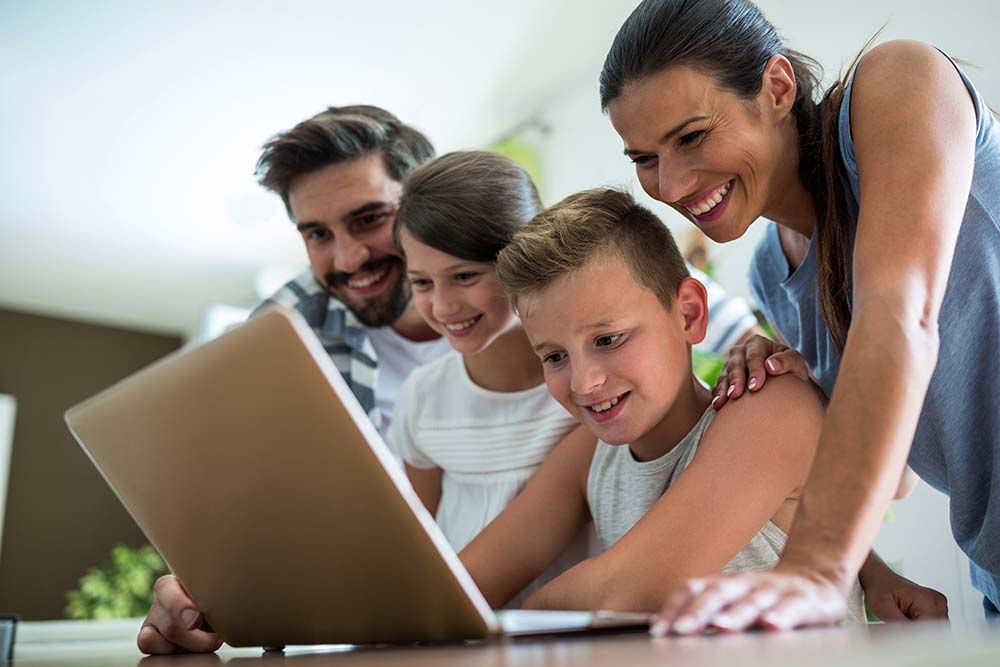 family-using-laptop