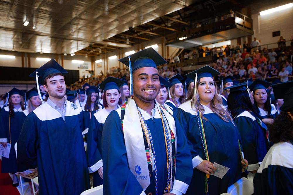 graduates at commencement