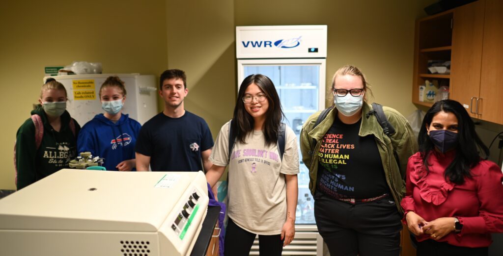 Dr. Jamburuthugoda with research students at Biology Lab Crawl