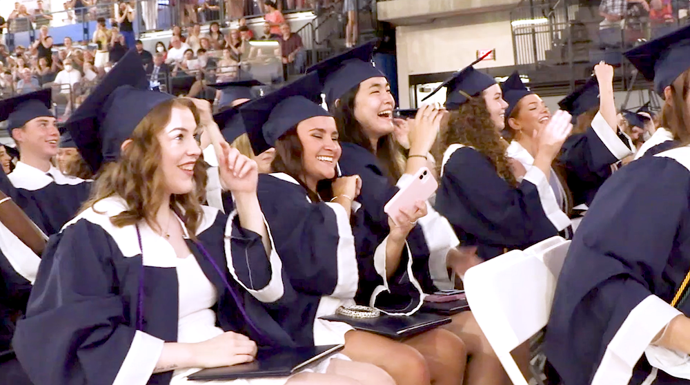 Graduates celebrating at Commencement
