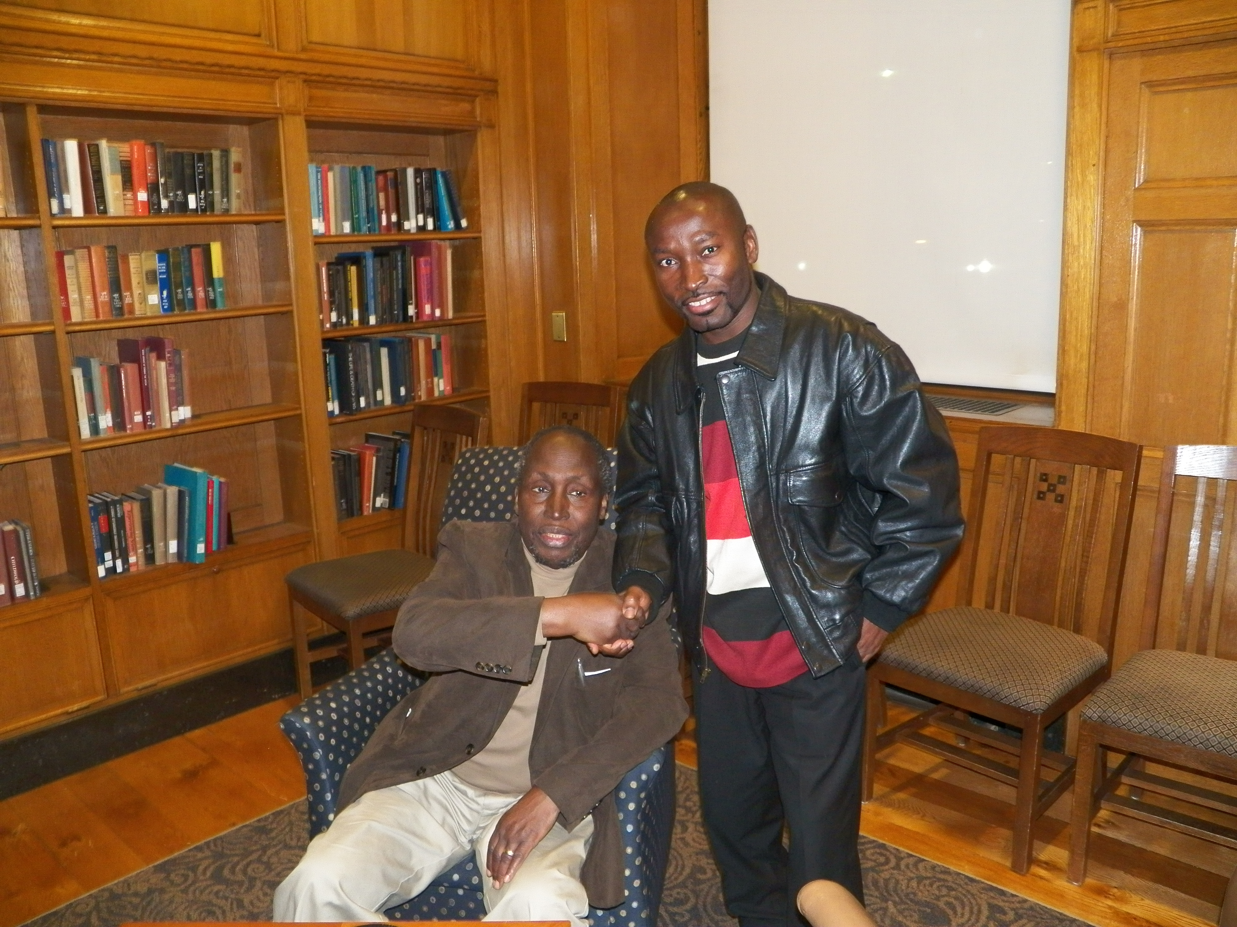 Photo of Dr. adabra standing next to Ngugi Wa Thiong'o