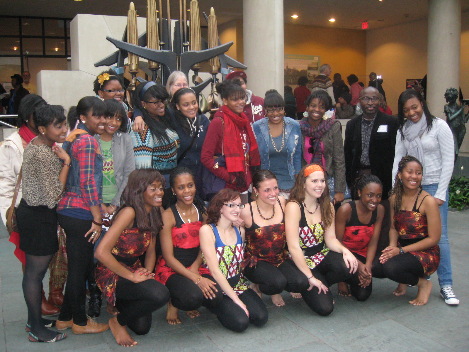 Photo of Dr. Adabra and a group of students
