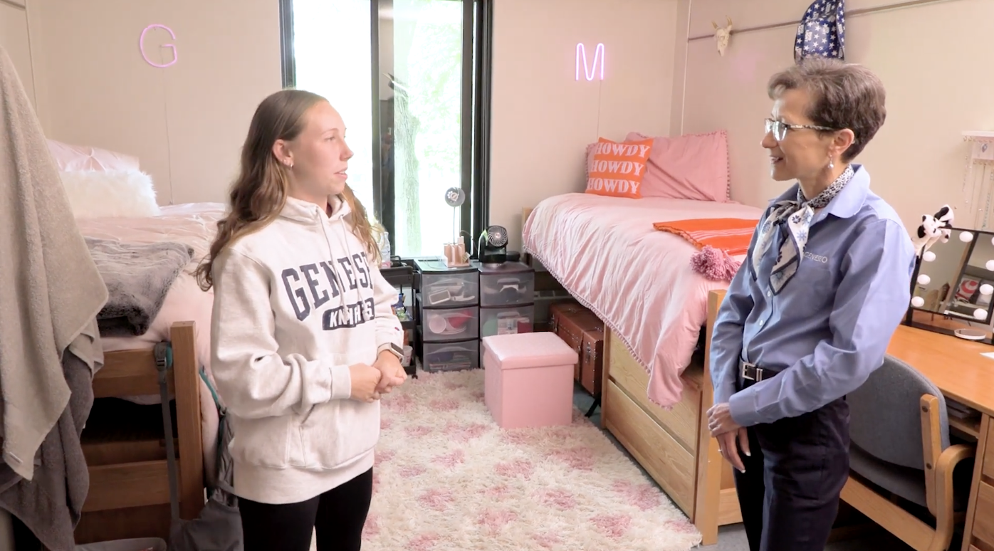 President  Battles speaks to Greta Recktenwald '26 in her residence hall.