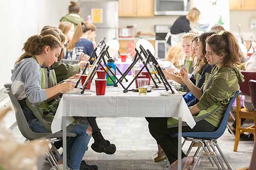 students painting