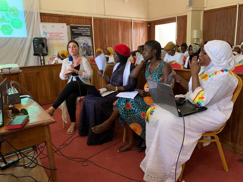 Holly Nicole Kandel '16 speaks at a women's meeting in Senegal.