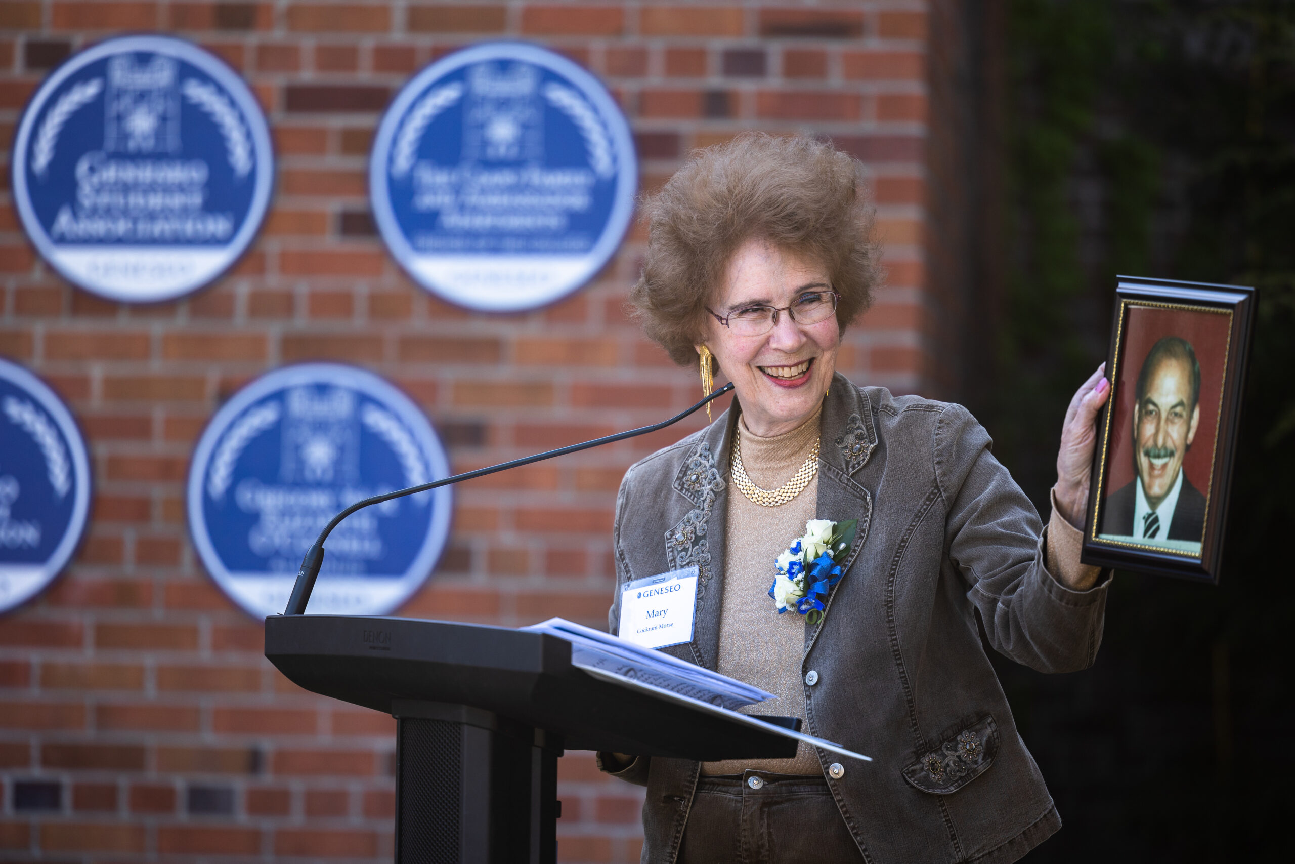 Mary Morse holding picture of her late husband William Morse