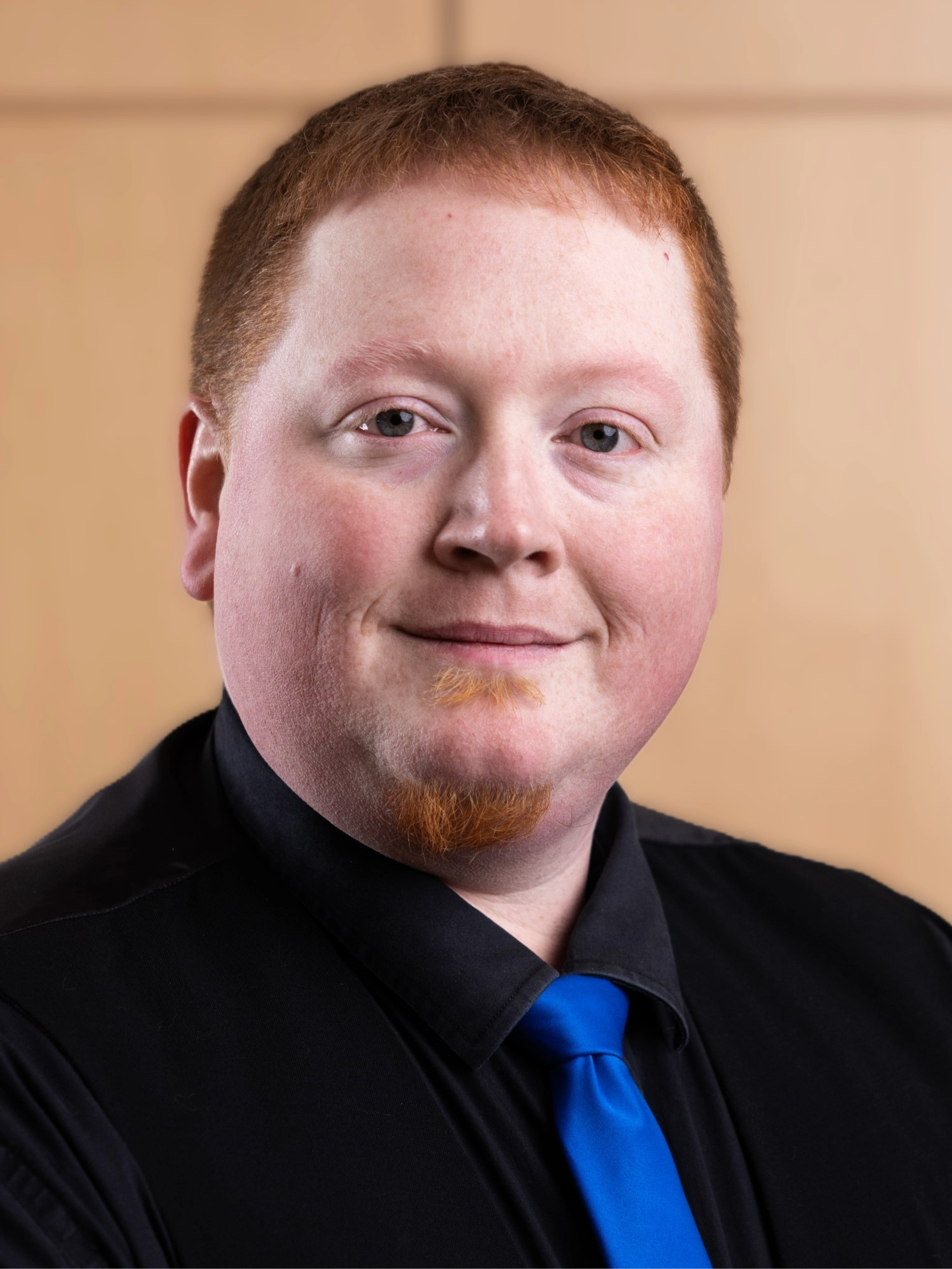 cropped head shot Faculty Profile Image