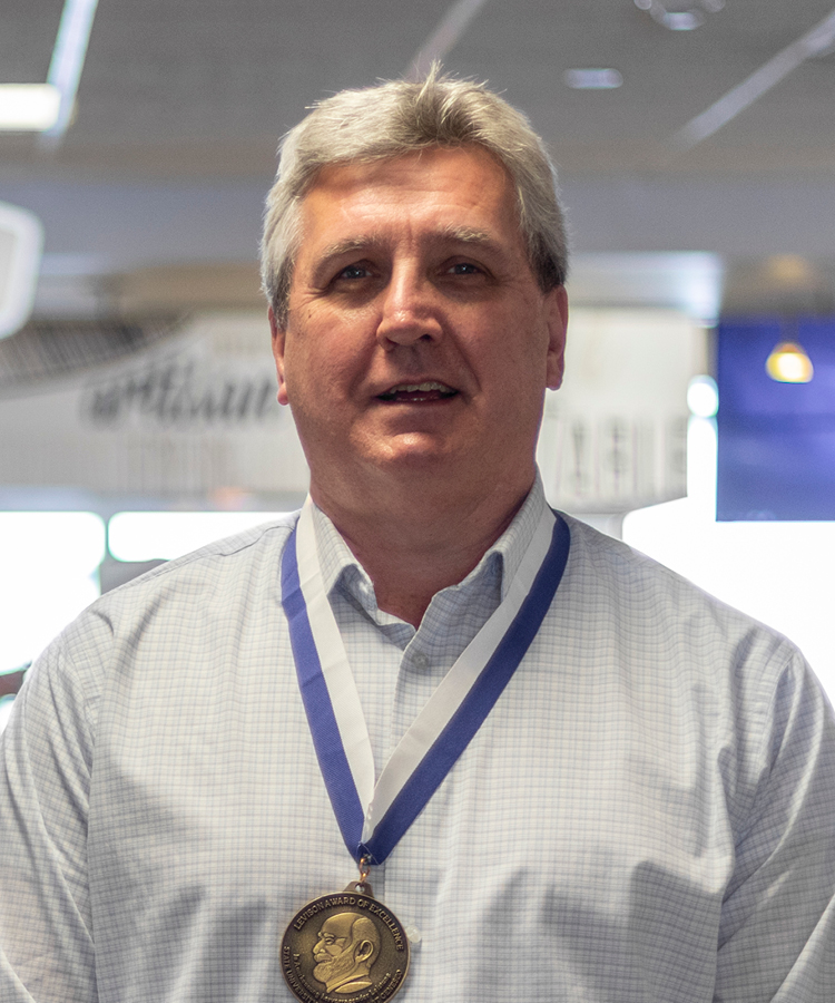 Headshot of Tom Du0026#039;Angelo