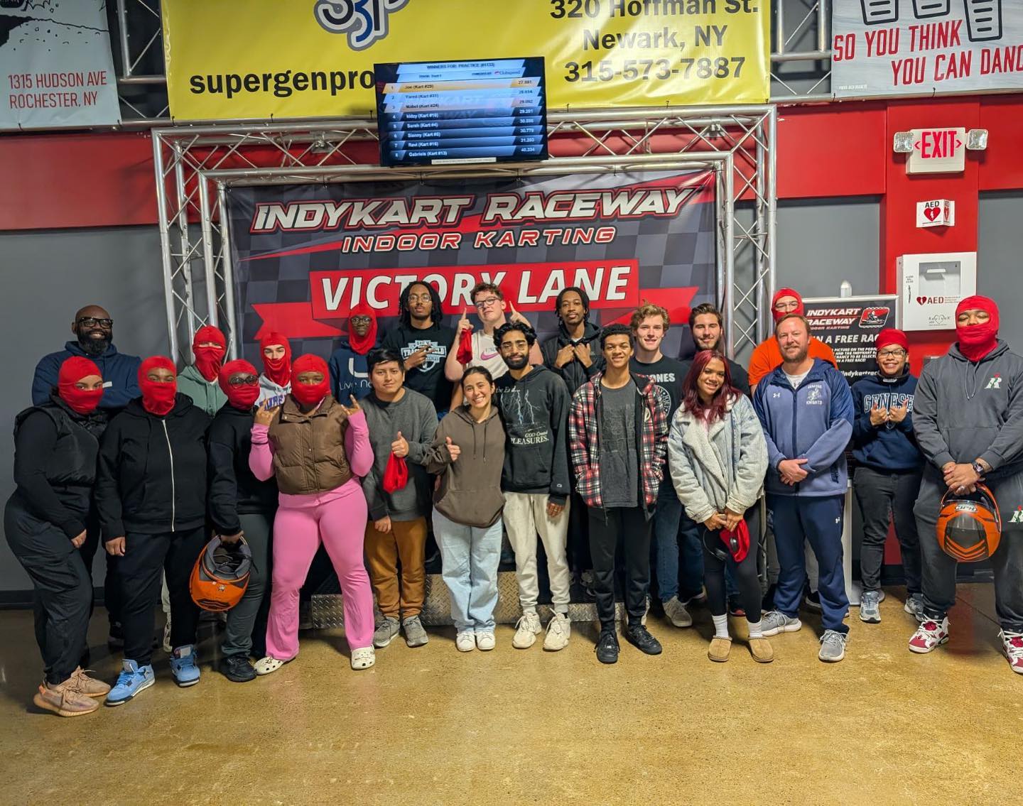 Group of Indy Kart riders wearing their red masks