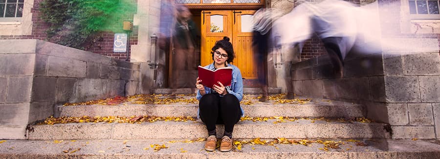 Student reading a book