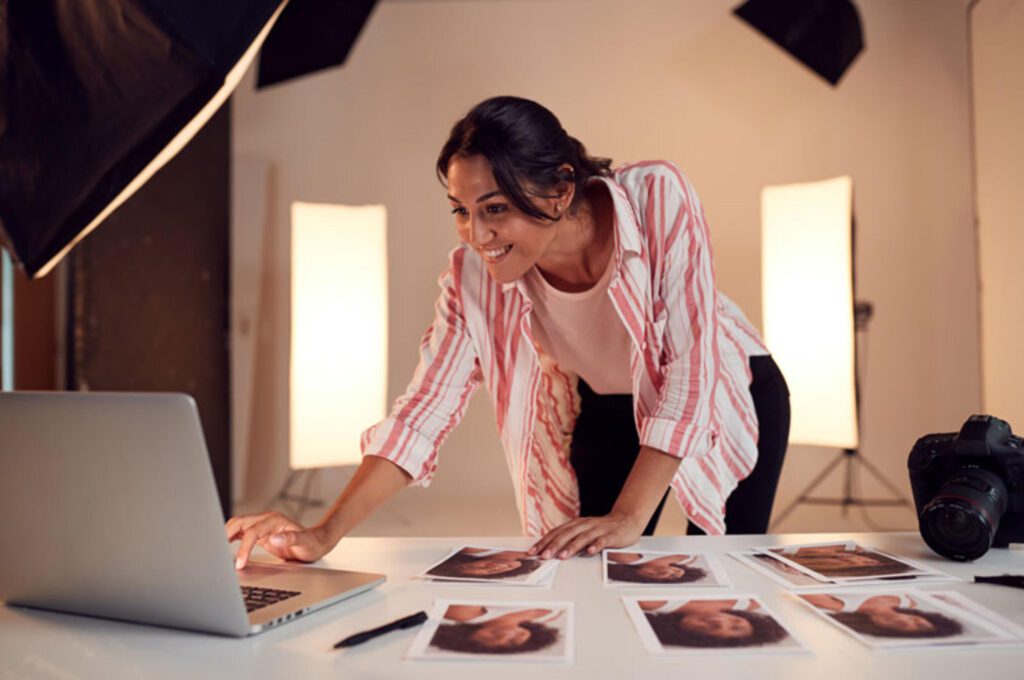 Female photographer editing images