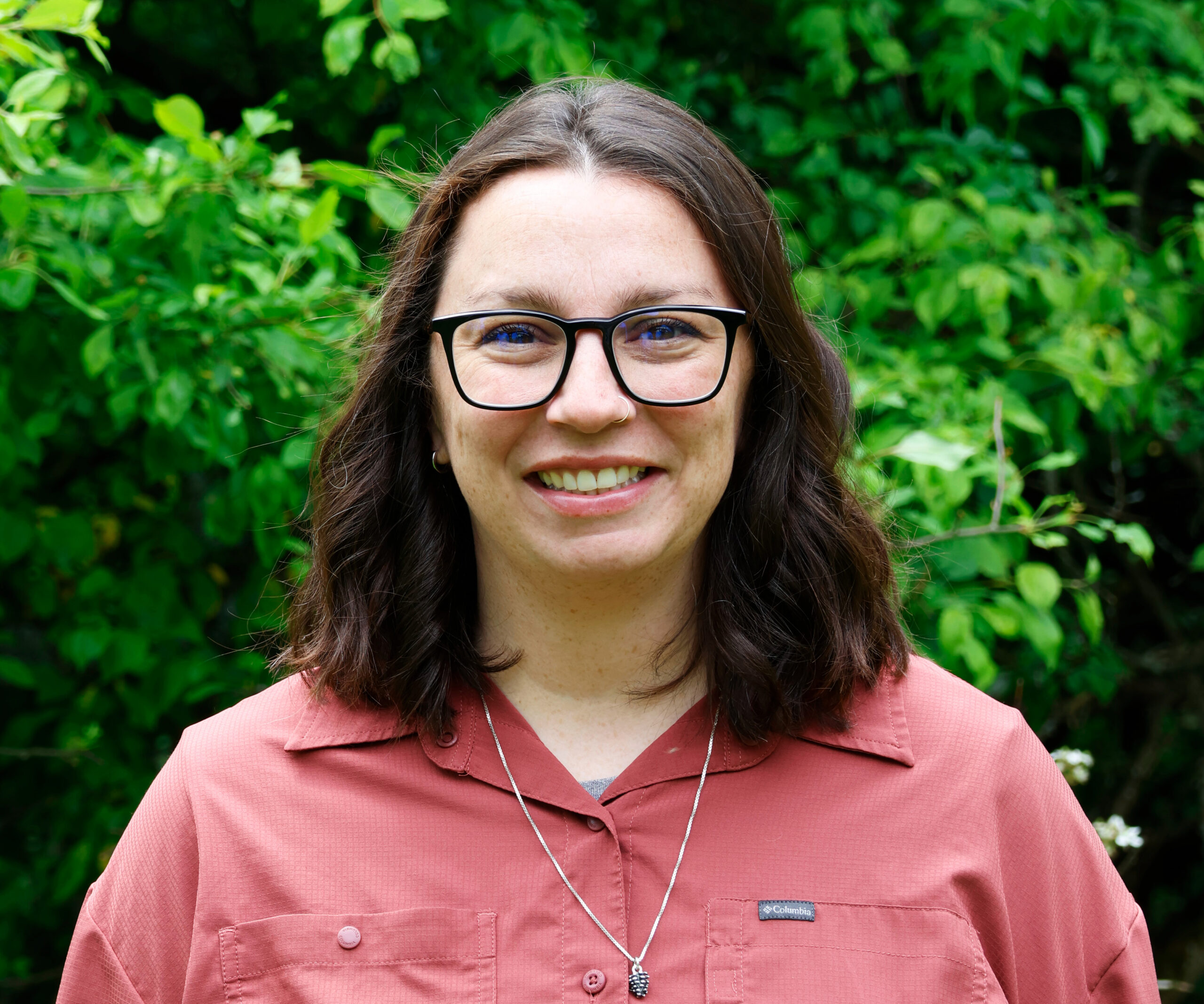 Marisa Riggin with a salmon colored shirt