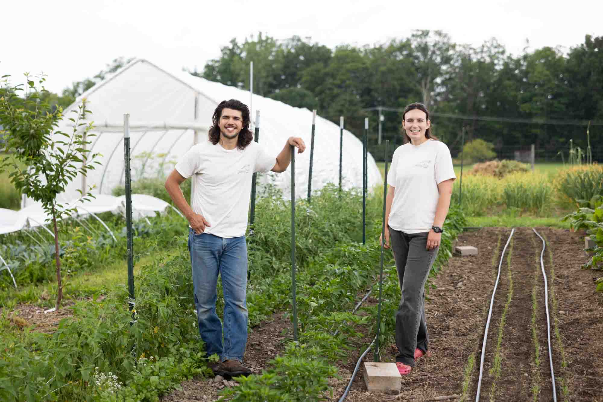 274A1579 Sean Perry and Bari Zeiger standing in front of garden beds.