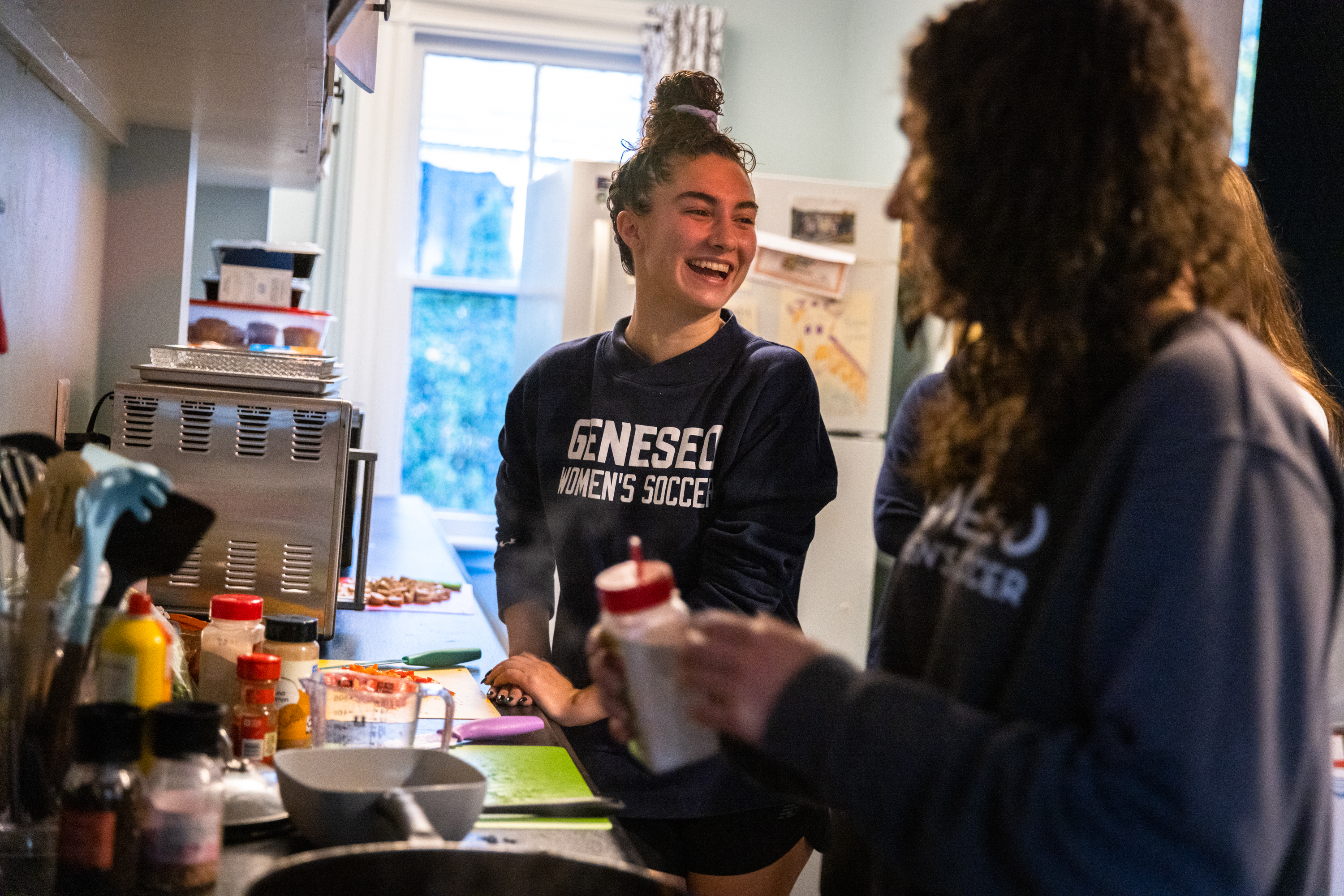 Camaraderie and friendship among teammates is a main reason Julia Dell Aquila '22 chose to play a fifth year of Geneseo soccer. (Photo by Matt Burkhartt)