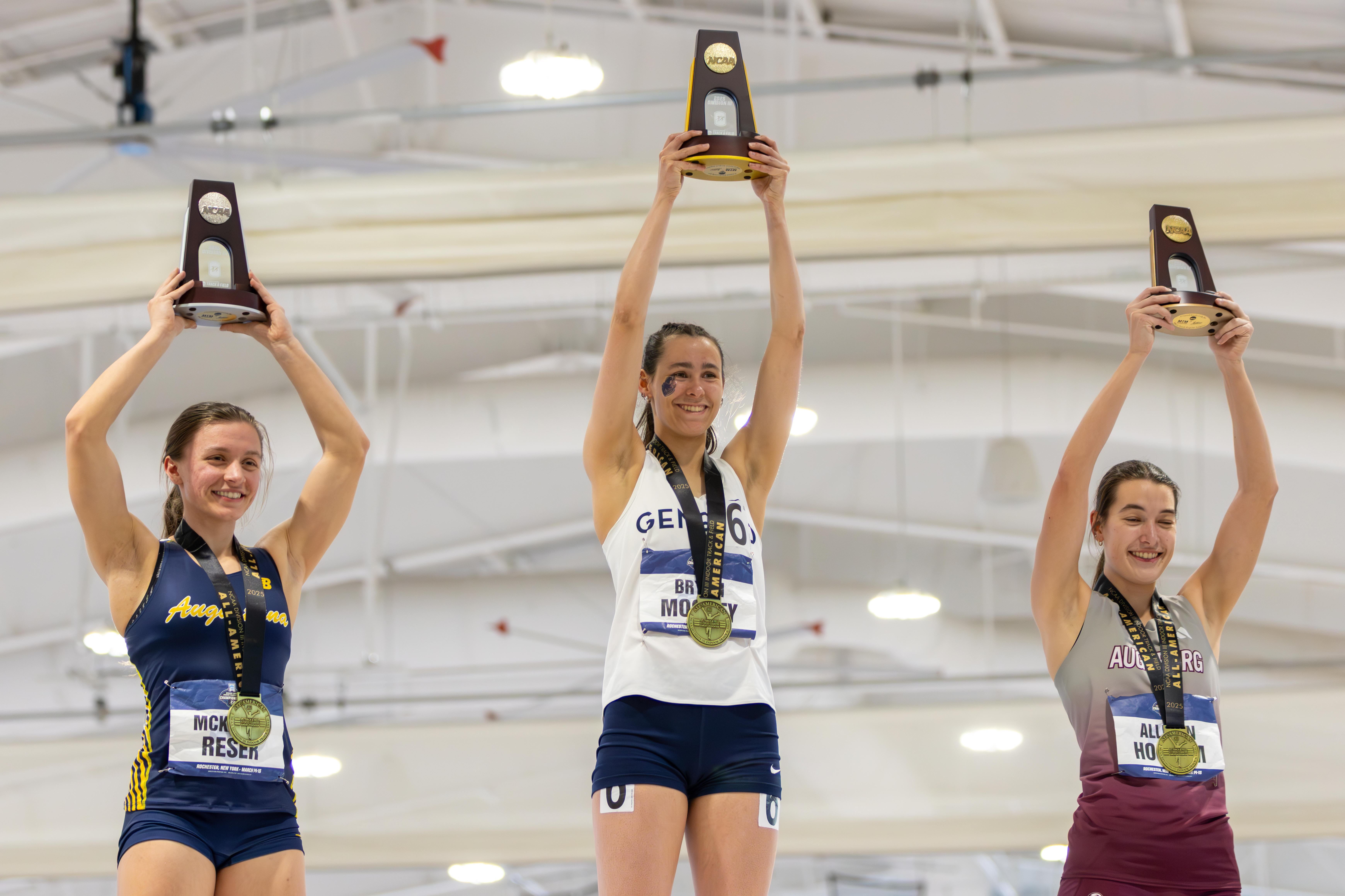 Brynn Mooney holding the trophy up