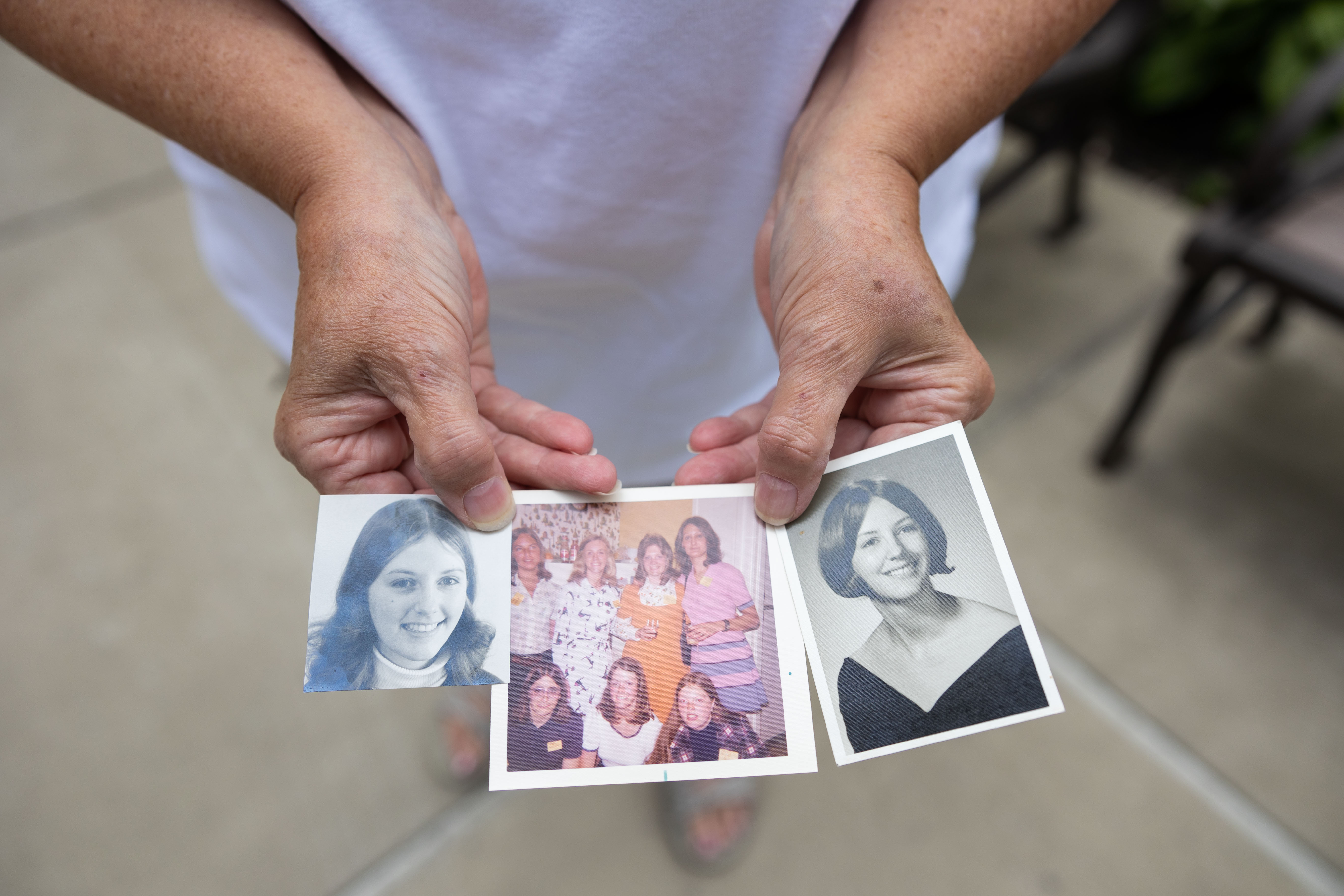 Karen Brown Bryant '74holding three images of herself from Geneseo.