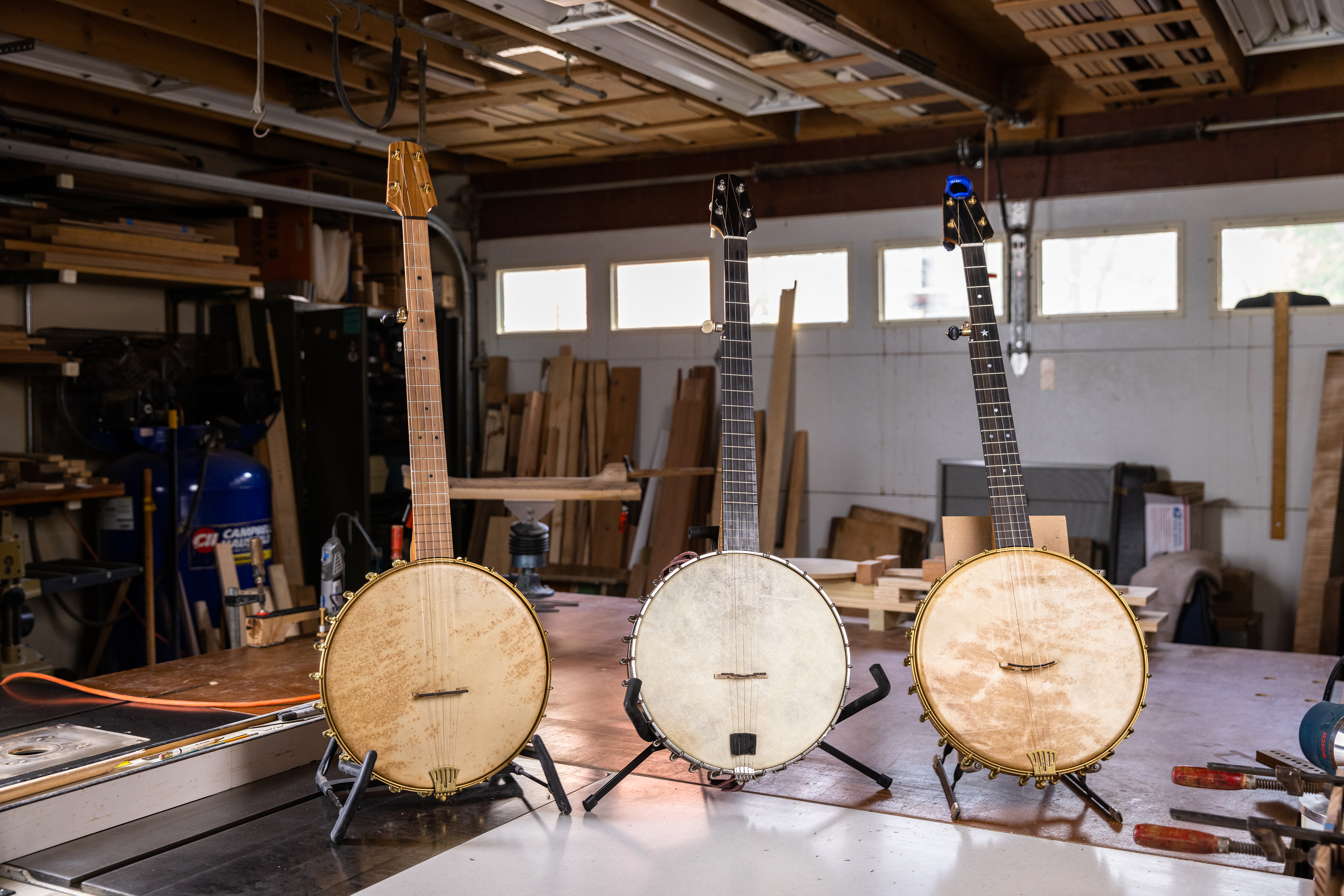 Three banjos made by John