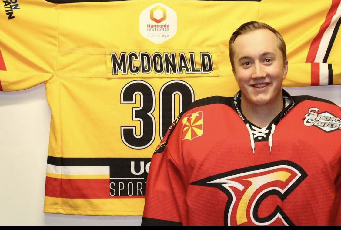 Devin McDonald' 19 with his jersey.