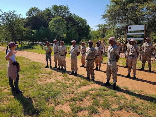 Tara Keir '14 with an anti-poaching unit.