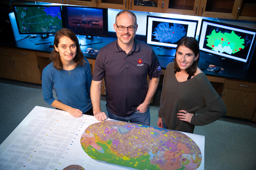 Assistant Professor Nick Warner and two students in the planetary geology lab at Geneseo.