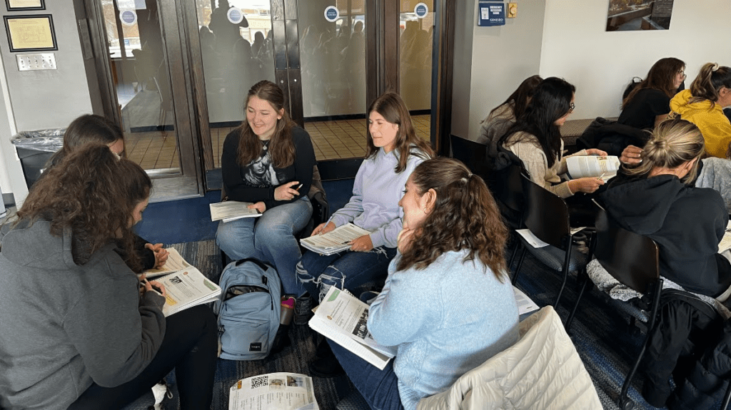 Students gathered together studying