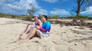 Brynn Westlake '28, left, and Jacqueline Horsch '29 record observations in their field notes
