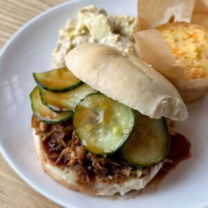 Pulled pork sandwich with housemade pickles